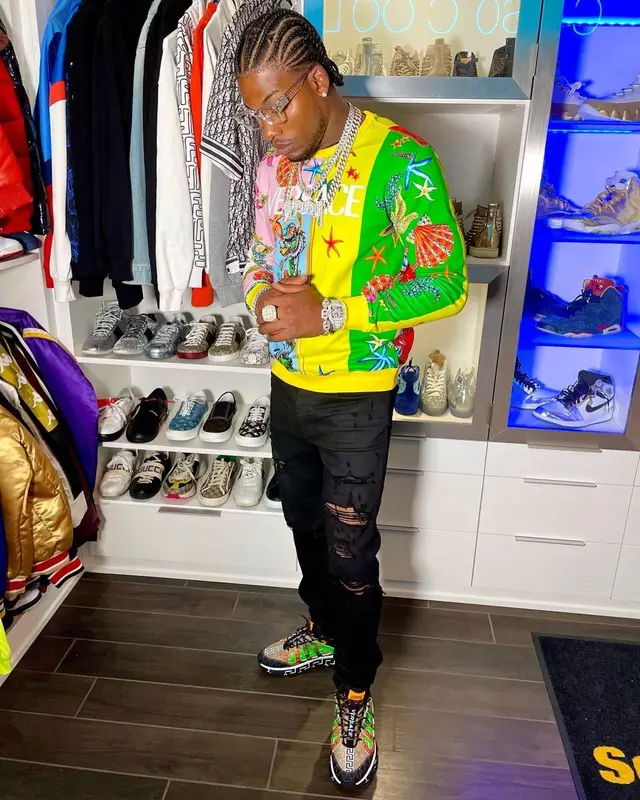 CJ So Cool outfit in Versace, Amiri, and Louis Vuitton, 2021