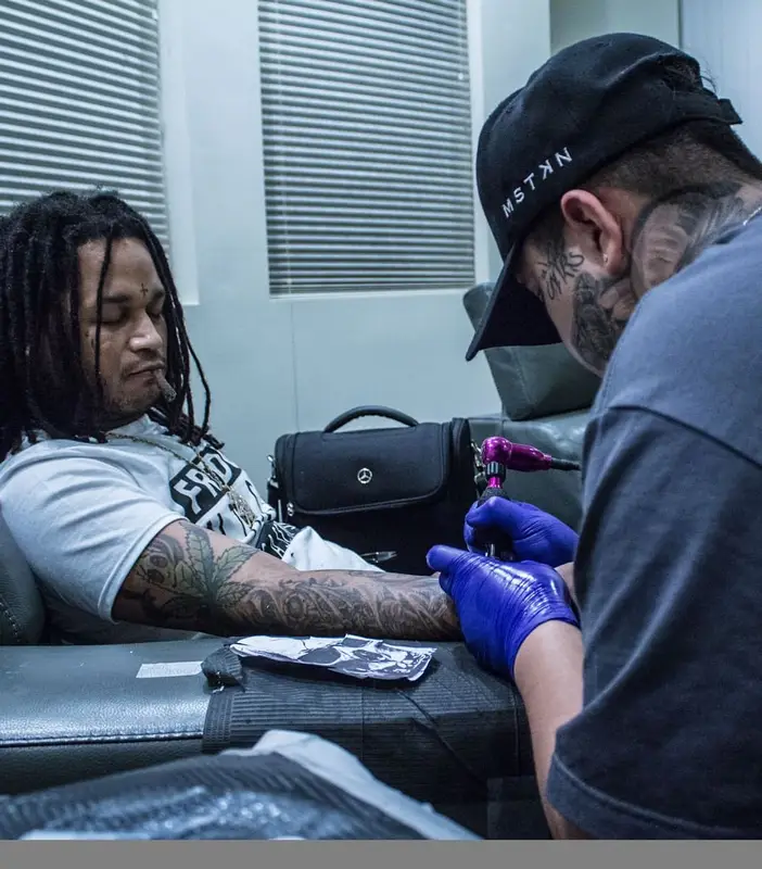 Fredo Santana outfit in Savage Squad Records Merch and Nike, 2018