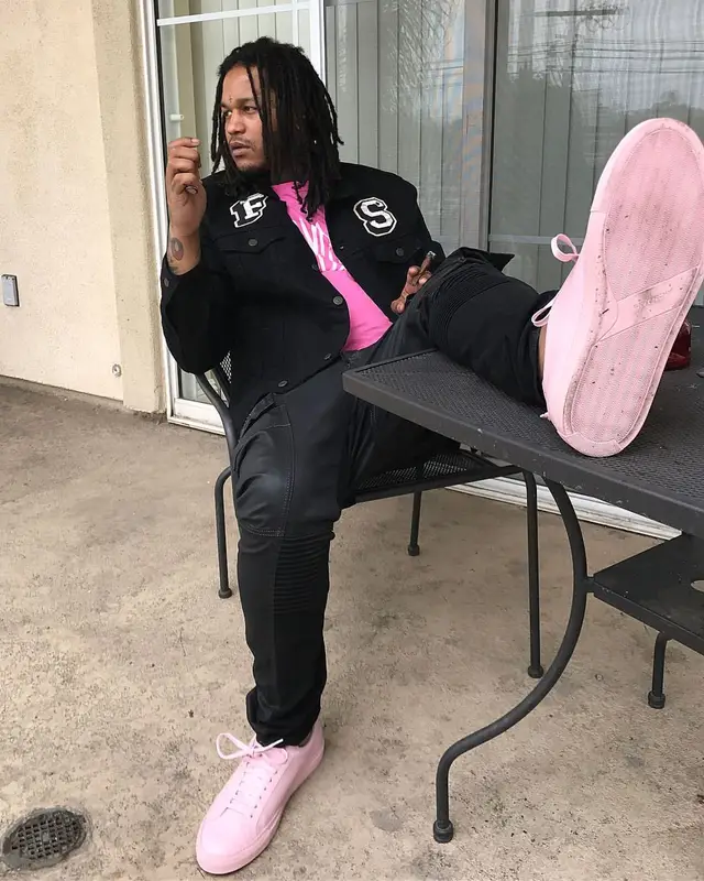 Fredo Santana outfit in Etai Drori, Savage Squad Records Merch, and Givenchy, 2017