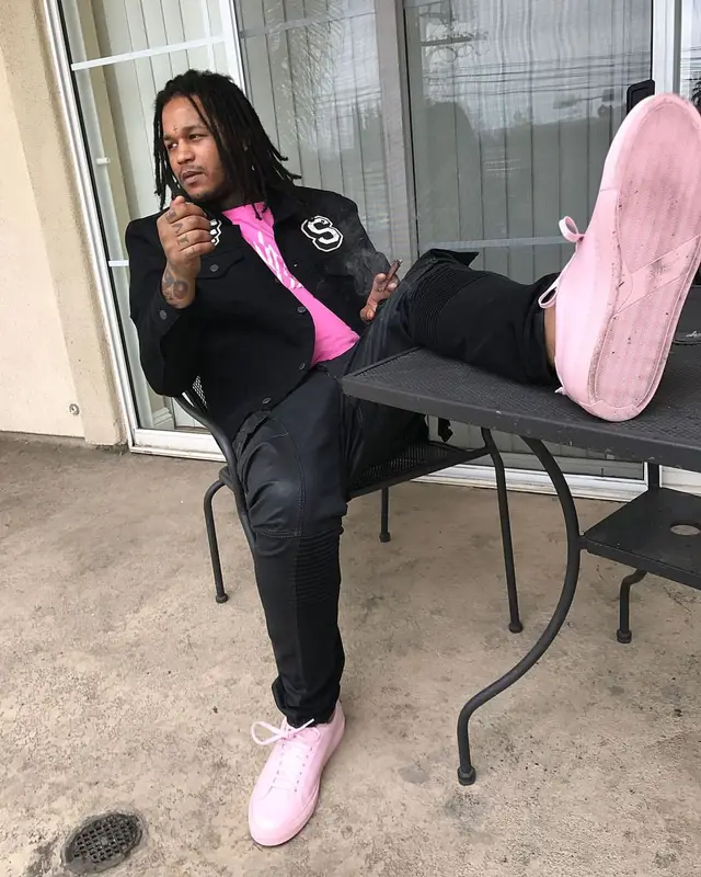 Fredo Santana outfit in Etai Drori, Savage Squad Records Merch, and Givenchy, 2017