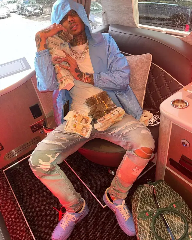 Fredo outfit in Louis Vuitton, Nike, and Dior, 2021