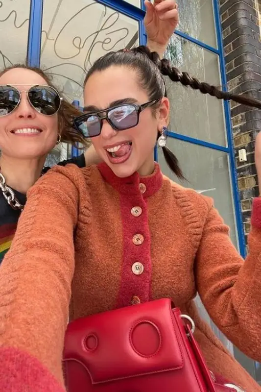 Dua Lipa outfit in Alaïa, Off-White, and Lexxola, 2021