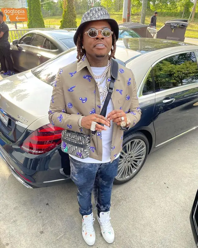 Gunna outfit in Kenny Scharf, Purple Brand, and Dior, 2021