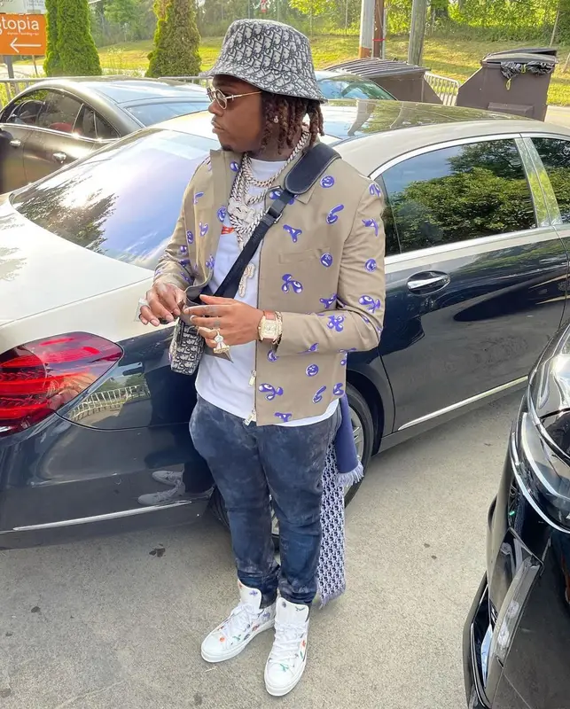 Gunna outfit in Kenny Scharf, Purple Brand, and Dior, 2021