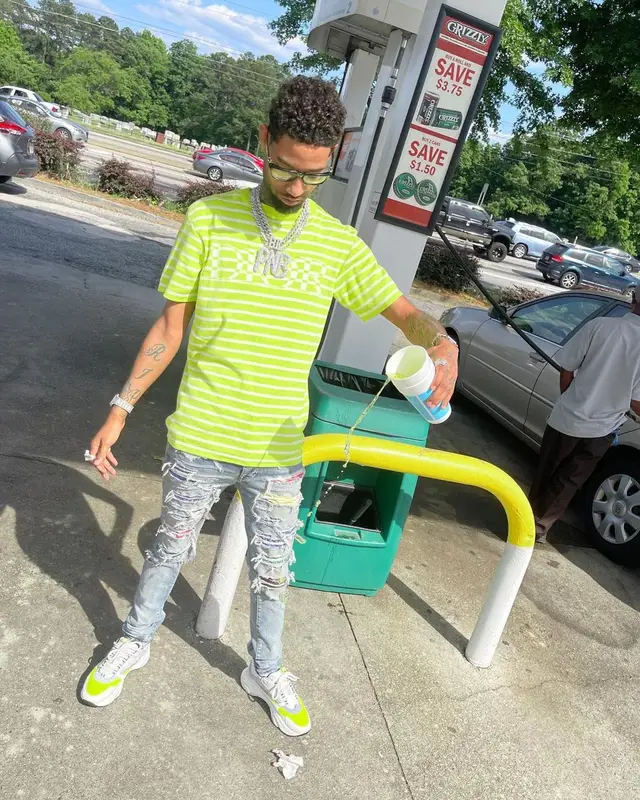 PnB Rock outfit in Dior, Amiri, and Chrome Hearts, 2021