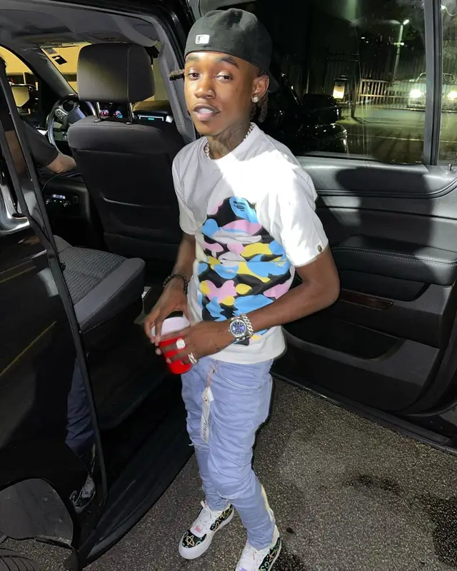 Jhacari outfit in Bape, Purple Brand, and New Era, 2021