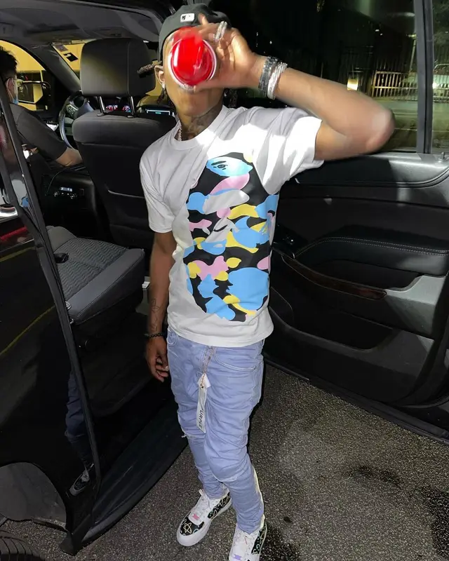 Jhacari outfit in Bape, Purple Brand, and New Era, 2021