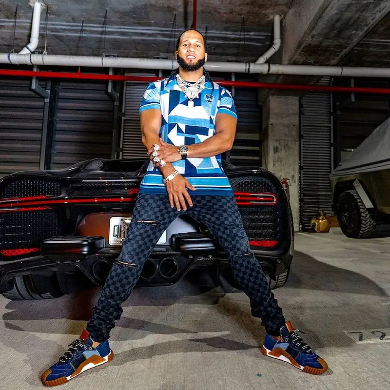 El Alfa El Jefe outfit in Dolce & Gabbana, Amiri, and Retrosuperfuture, 2021