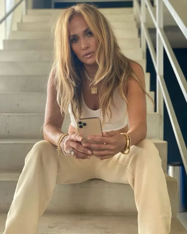 Jennifer Lopez outfit in Gucci, Fallon Jewelry, and Quay Australia, 2021