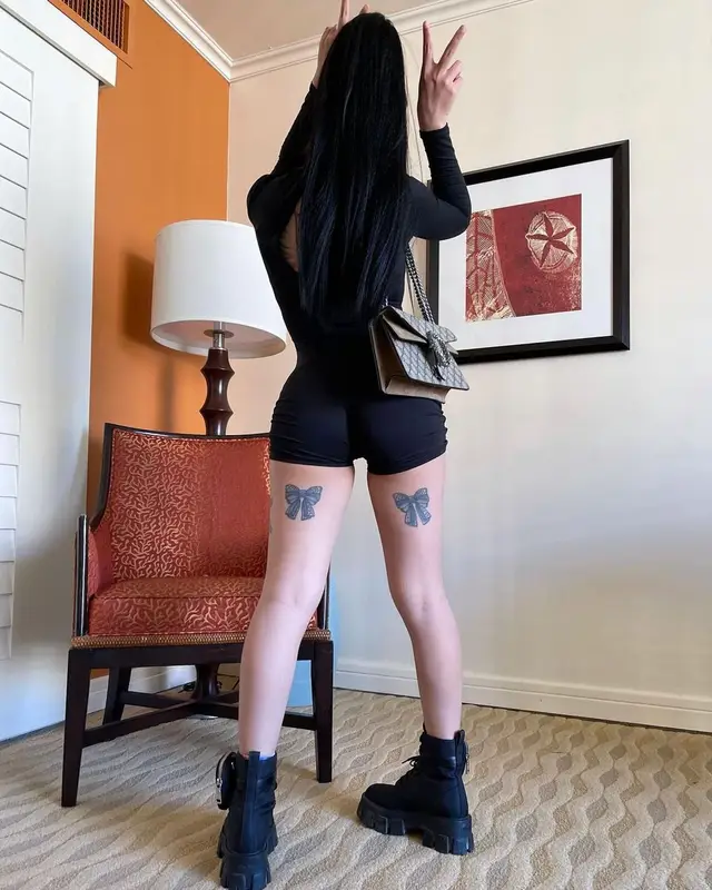 Bella Poarch outfit in Prada, Gucci, and FashionNova, 2021