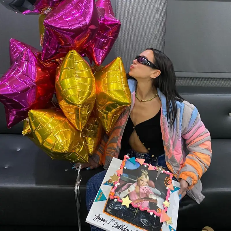 Dua Lipa outfit in ERL, Versace, and Eytys, 2021