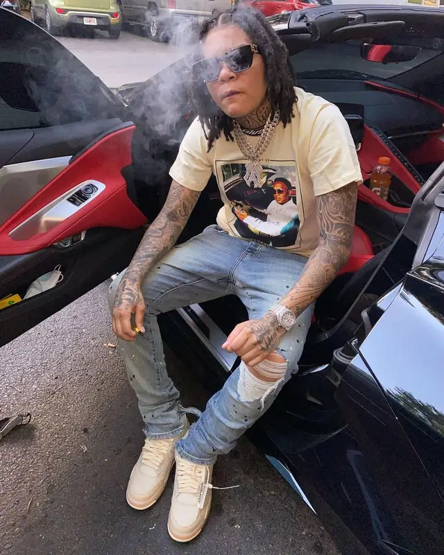 Young M.A outfit in Purple Brand, Jordan, and Louis Vuitton, 2021