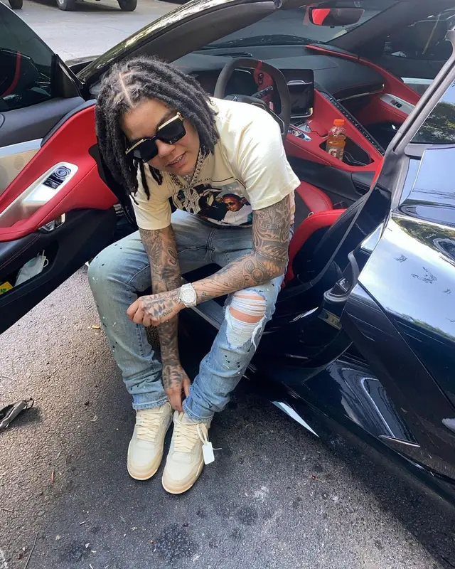 Young M.A outfit in Purple Brand, Jordan, and Louis Vuitton, 2021