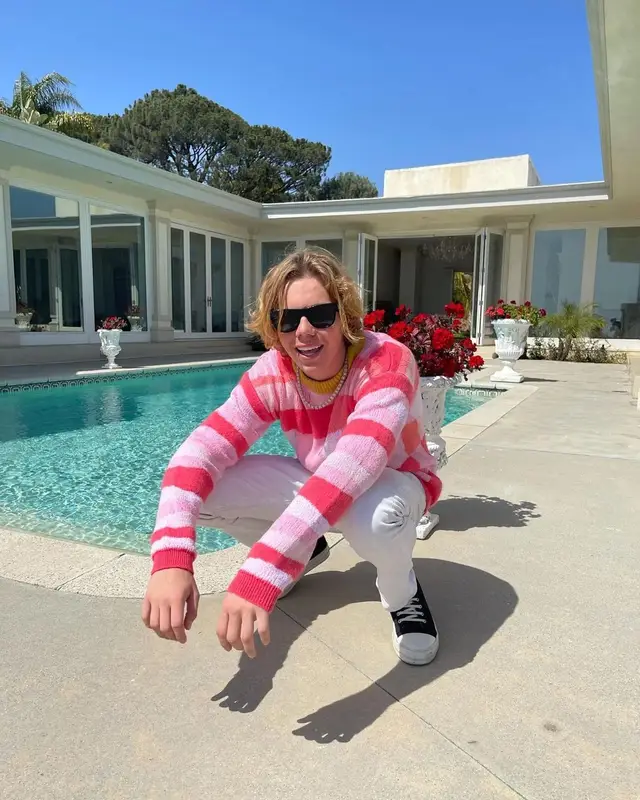 The Kid Laroi outfit in ERL, Purple Brand, and Louis Vuitton, 2021