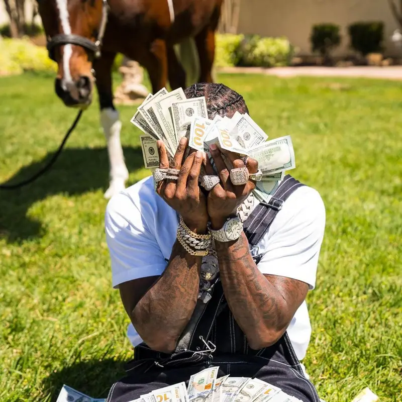 DaBaby outfit in Amiri, Dior, and Nike, 2021