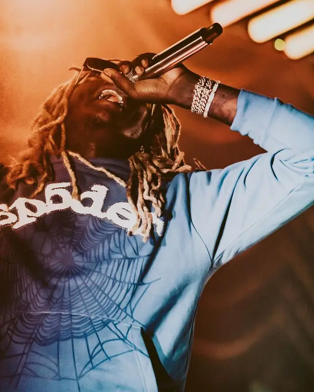 Young Thug outfit in Spider Worldwide, Nike, and Prada, 2021