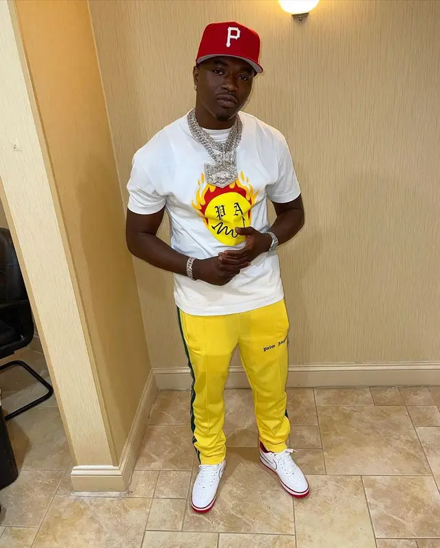 Bankroll Freddie outfit in Palm Angels, Nike, and New Era, 2021