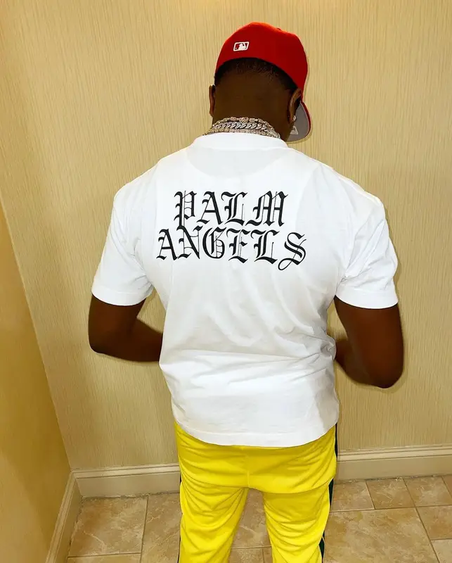 Bankroll Freddie outfit in Palm Angels, Nike, and New Era, 2021