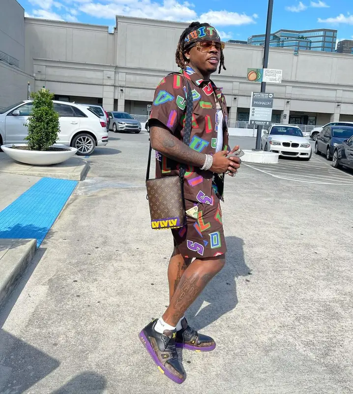 Gunna outfit in Louis Vuitton, NBA, and Celine, 2021