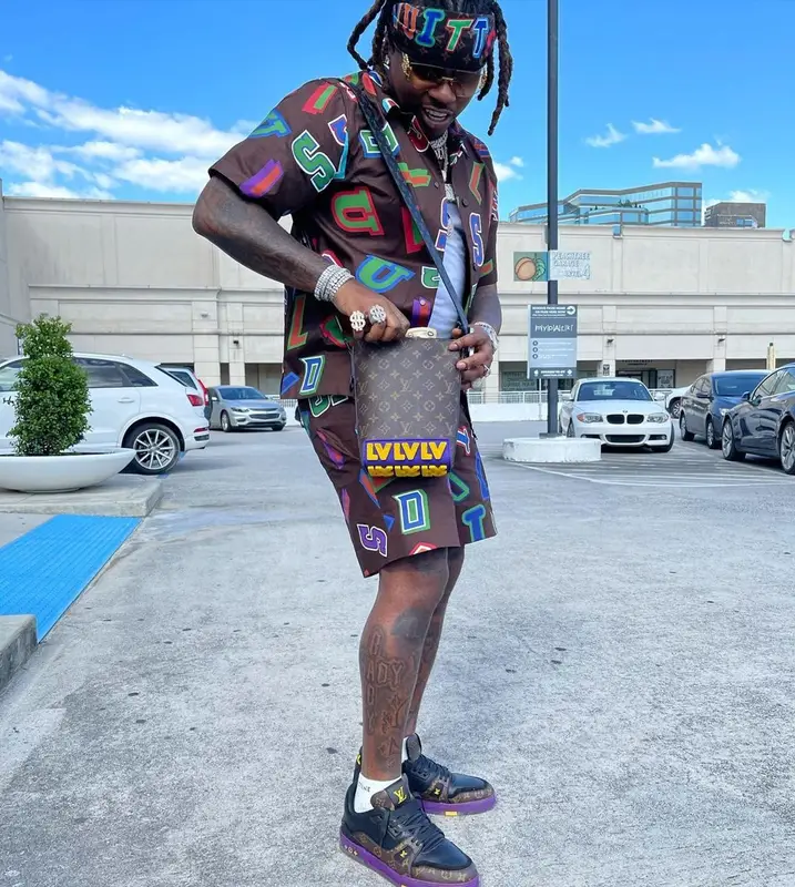 Gunna outfit in Louis Vuitton, NBA, and Celine, 2021