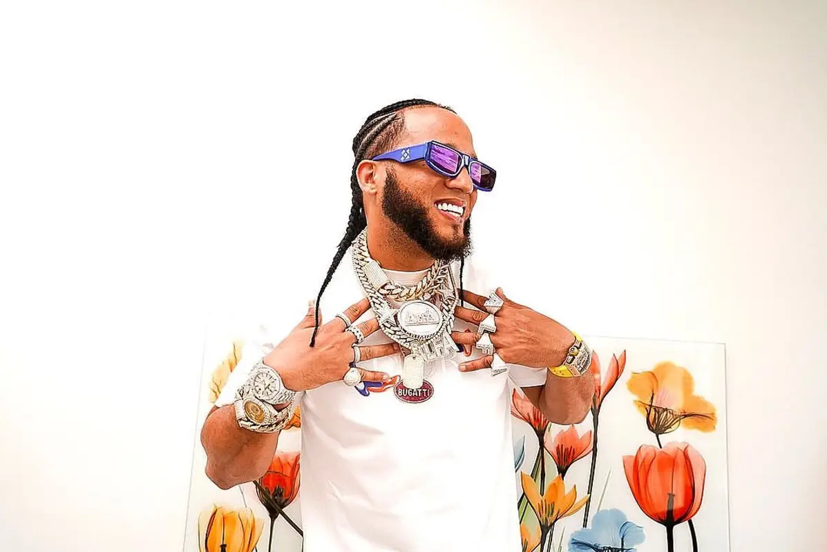 El Alfa El Jefe outfit in Dior, Retrosuperfuture, and Kenny Scharf, 2021