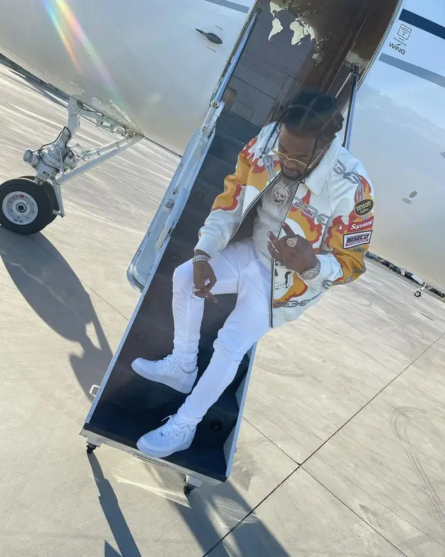 Rowdy Rebel outfit in Supreme, Dior, and Gucci, 2021