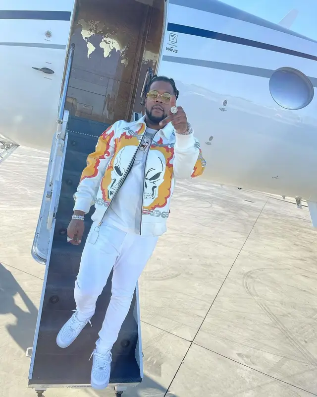Rowdy Rebel outfit in Supreme, Dior, and Gucci, 2021