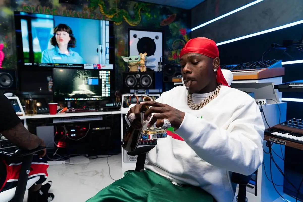 DaBaby outfit in Gucci, Amiri, and Nike, 2021