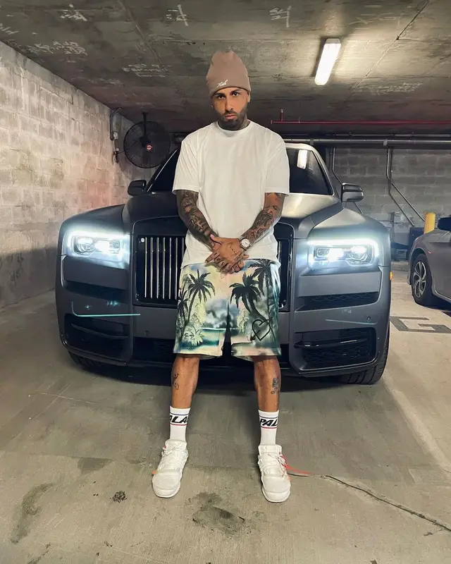 Nicky Jam outfit in Palm Angels, Kith, and Palace, 2021