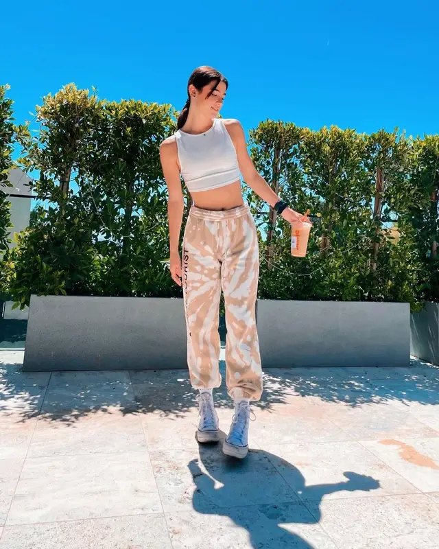 Charli D'Amelio outfit in Brandy Melville, Social Tourist, and Converse, 2021