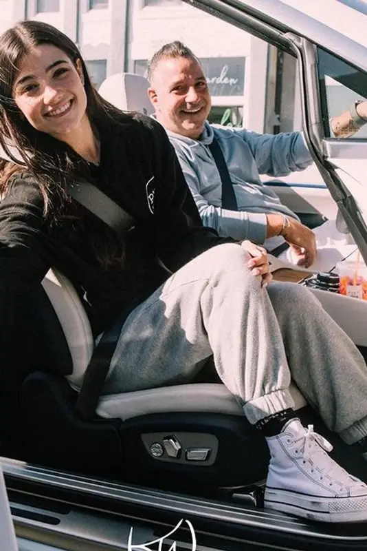 Charli D'Amelio outfit in Brandy Melville, Converse, and REVENGE, 2021