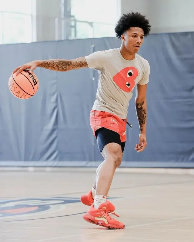 Mikey outfit in Comme Des Garcons, Nike, and NBA, 2021