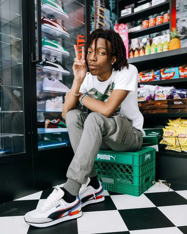 Lil Tecca outfit in Comme Des Garcons, Rick Owens, and Puma, 2021