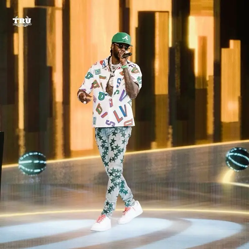 2 Chainz outfit in Louis Vuitton, New Era, and NBA, 2021
