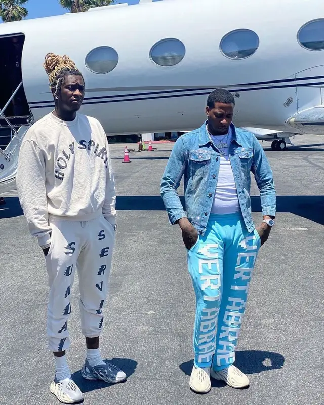 Young Thug outfit in Kanye West Merch, Adidas, and Nike, 2021