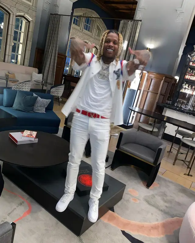 Lil Durk outfit in Louis Vuitton, Valentino, and NBA, 2021
