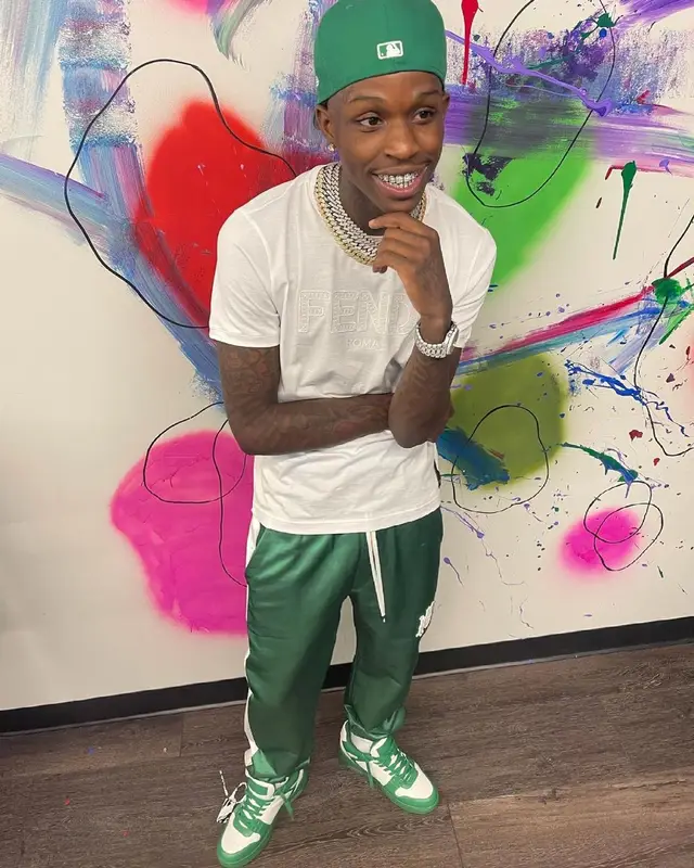 Quando Rondo outfit in Fendi, Amiri, and New Era, 2021