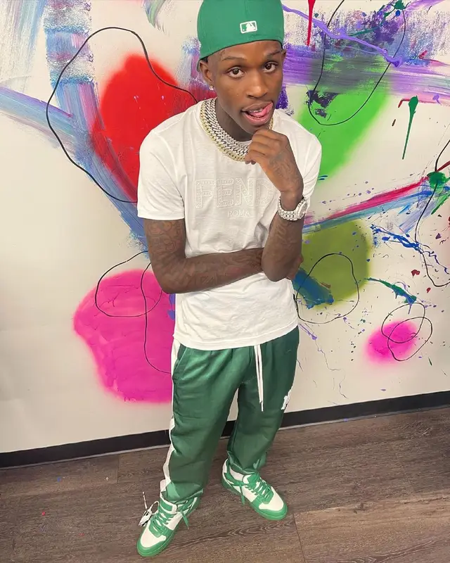 Quando Rondo outfit in Fendi, Amiri, and New Era, 2021