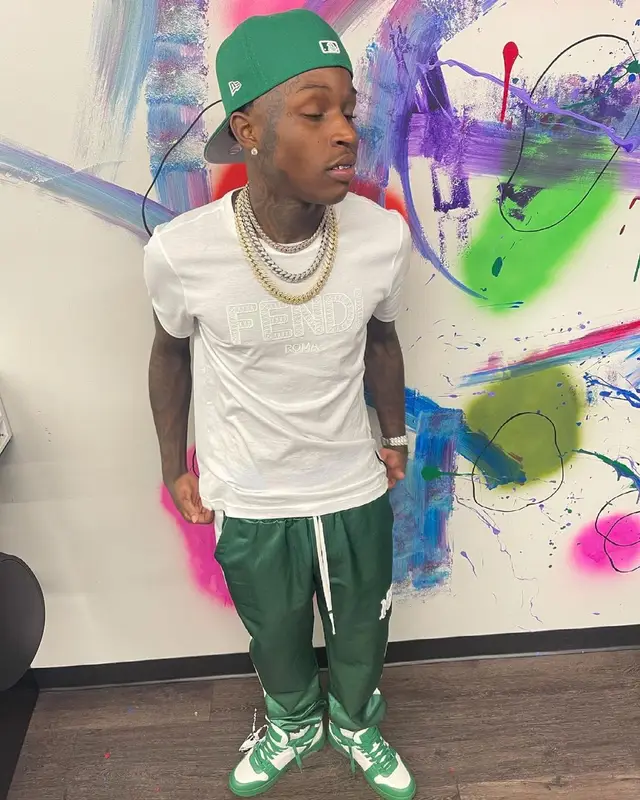 Quando Rondo outfit in Fendi, Amiri, and New Era, 2021