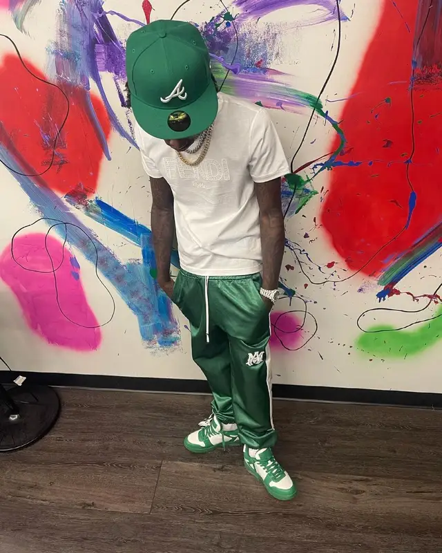 Quando Rondo outfit in Fendi, Amiri, and New Era, 2021