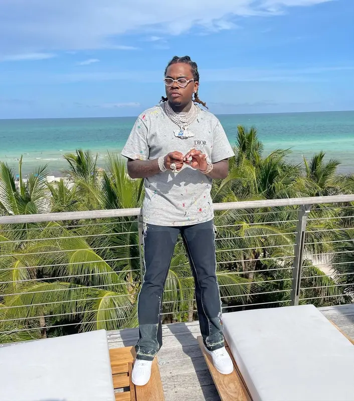 Gunna outfit in Dior, Cartier, and Jon Stan, 2021