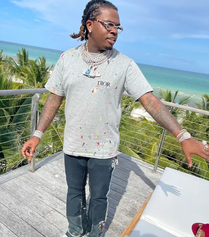 Gunna outfit in Dior, Cartier, and Jon Stan, 2021