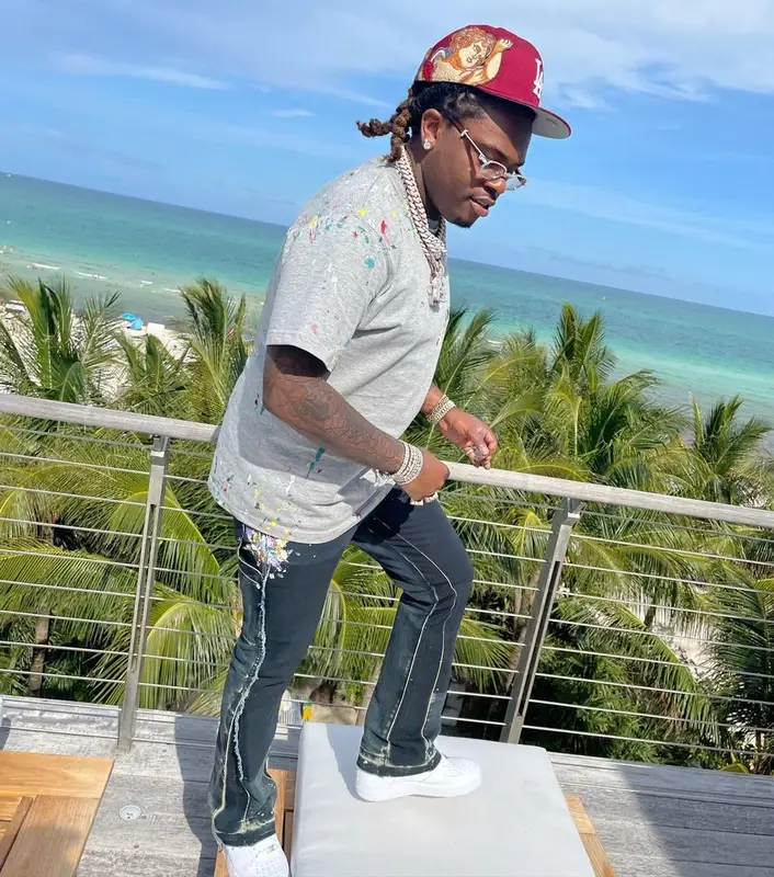 Gunna outfit in Dior, Cartier, and Jon Stan, 2021