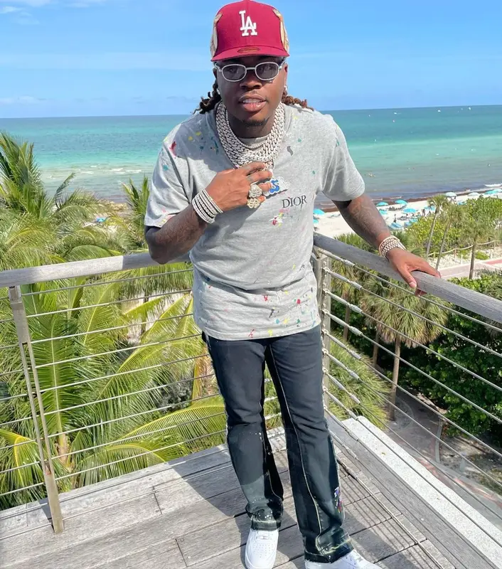 Gunna outfit in Dior, Cartier, and Jon Stan, 2021