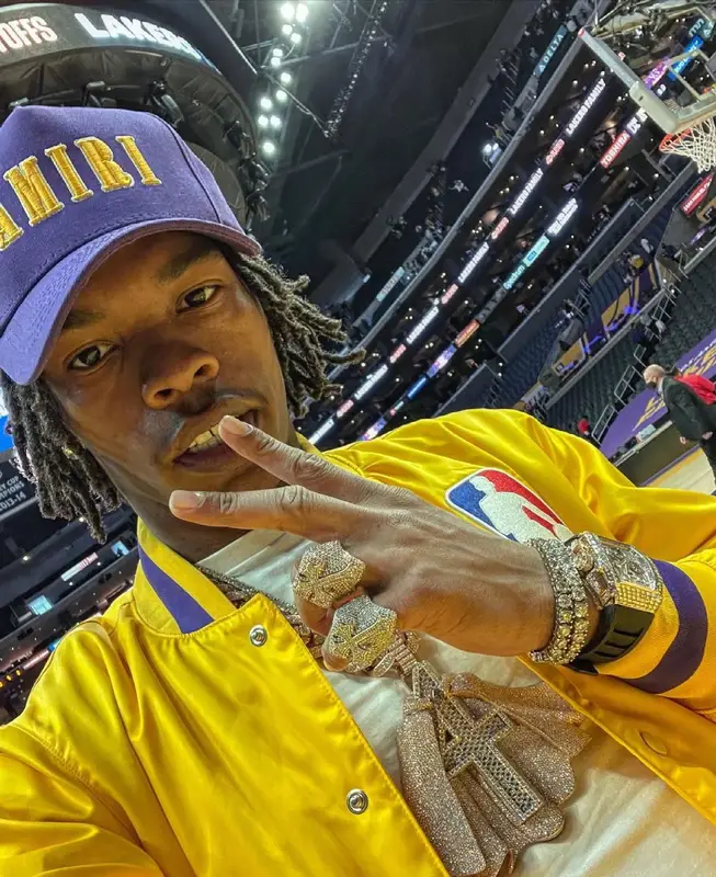 Lil Baby outfit in Nike, Amiri, and NBA, 2021