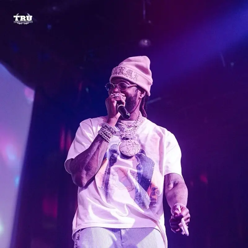 2 Chainz outfit in Louis Vuitton, Supreme, and Goyard, 2021