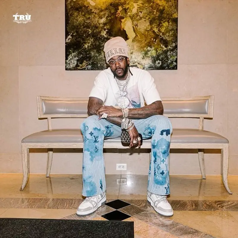 2 Chainz outfit in Louis Vuitton, Supreme, and Goyard, 2021