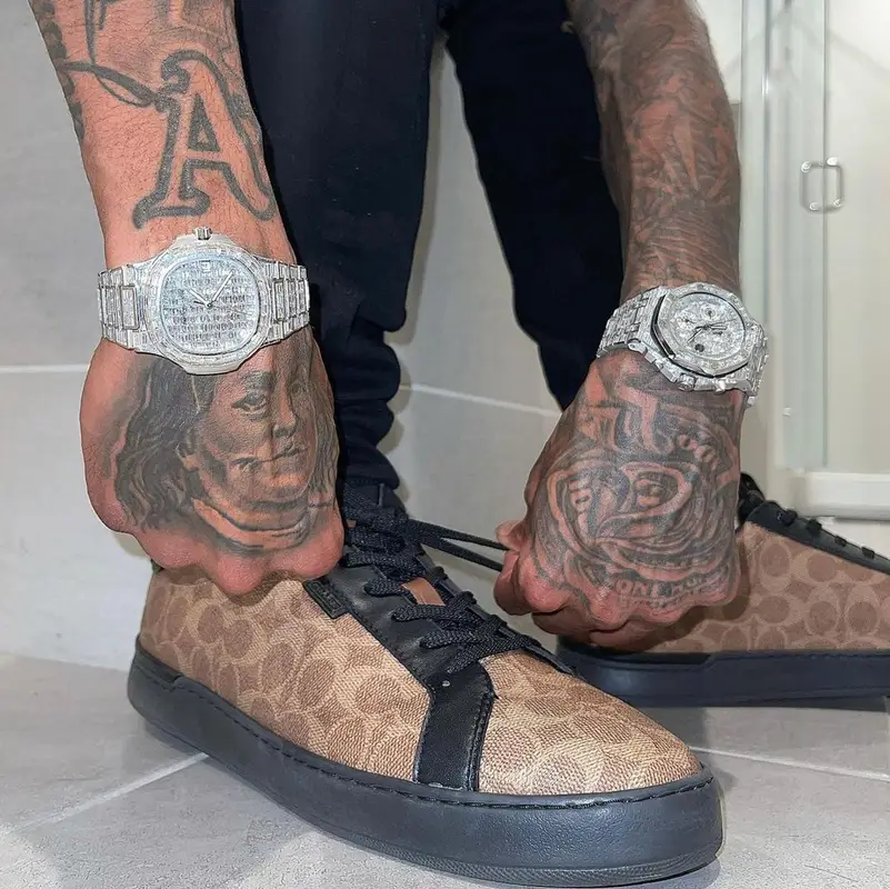 Blueface outfit in Mitchell & Ness, Amiri, and Coach, 2021