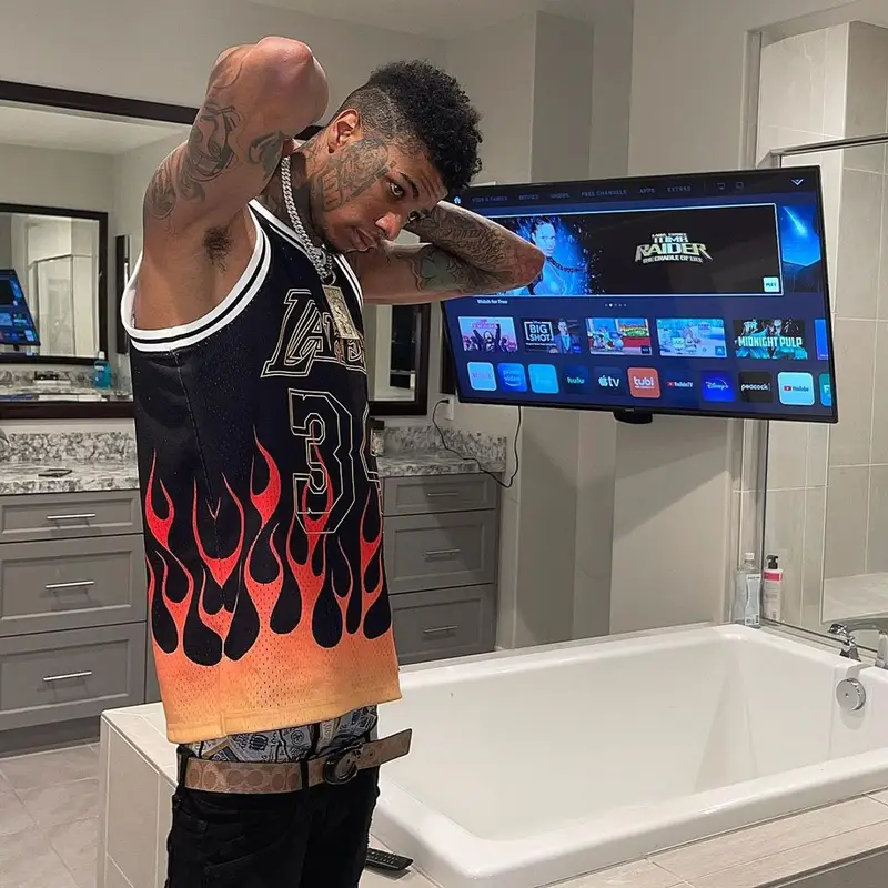 Blueface outfit in Mitchell & Ness, Amiri, and Coach, 2021