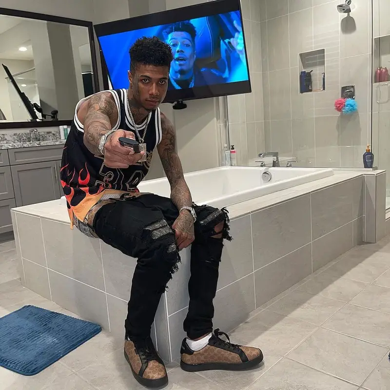 Blueface outfit in Mitchell & Ness, Amiri, and Coach, 2021